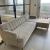 West Elm L shape grey sofa with gold legs