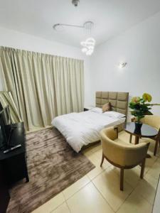 Fully furnished Room on rent in barsha heights with balcony & private bathroom