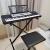 Yamaha keyboard with stand and bench