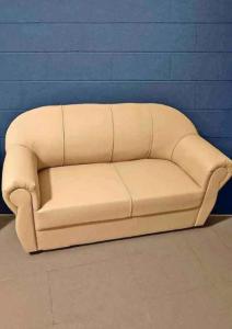 I'm selling 2 seater sofa brand new with delivery