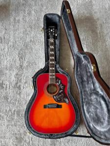 Epiphone hummingbird HS with Hard case.