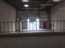 Warehouse with Small Mezzanine For Rent In Dubai Investment Park and Eaves Height 8M