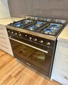 Smeg top gas oven electric cooker 90 by 60 cm latest model